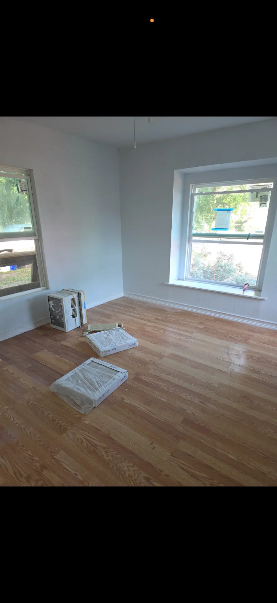 Finished room with new hardwood floors
