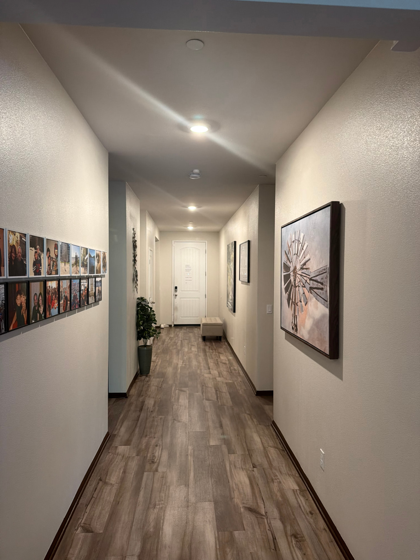 Completed hallway with fresh paint and wood floors